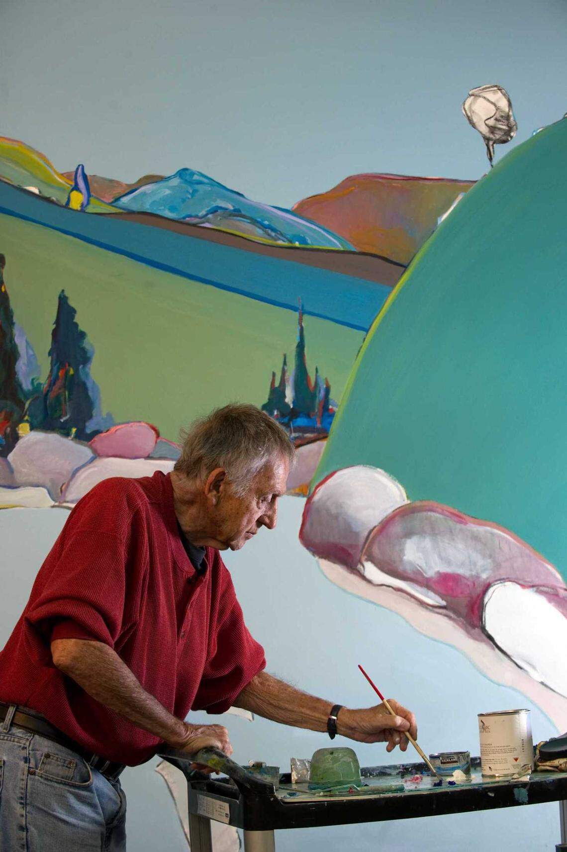 Artist Gregory Kondos works on a commission for the new Sacramento International Airport at his Clarksburg studio in 2010. The renowned painter died Friday, March 26, 2021, in Sacramento at the age of 97.