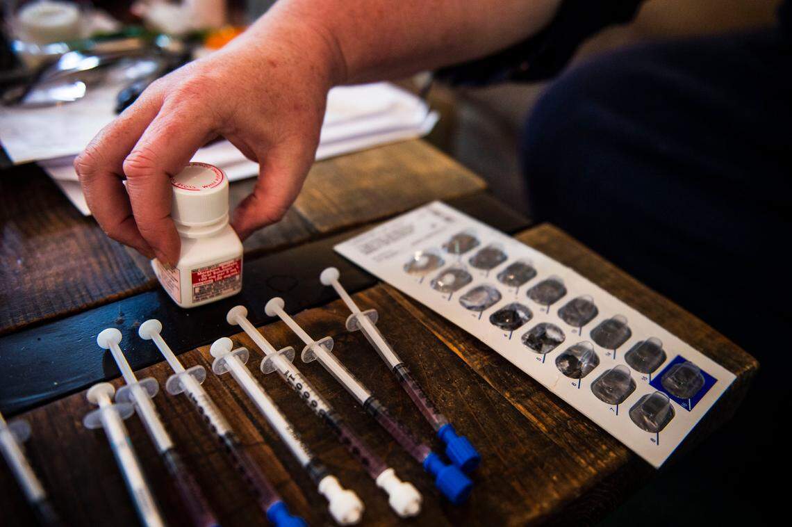 Drugs given to Tracy Sellers sits on a table in her home in Tahoe, Calif. Monday, August 5, 2019. Sellers claims the drugs were given to her without proper labeling and without written instructions.