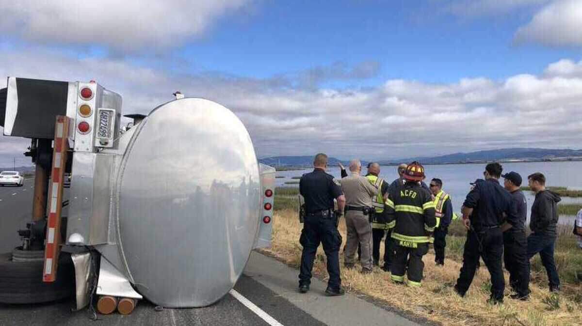 Westbound Highway 37 was closed Tuesday after a tanker carrying more than 3,800 gallons of fuel overturned.