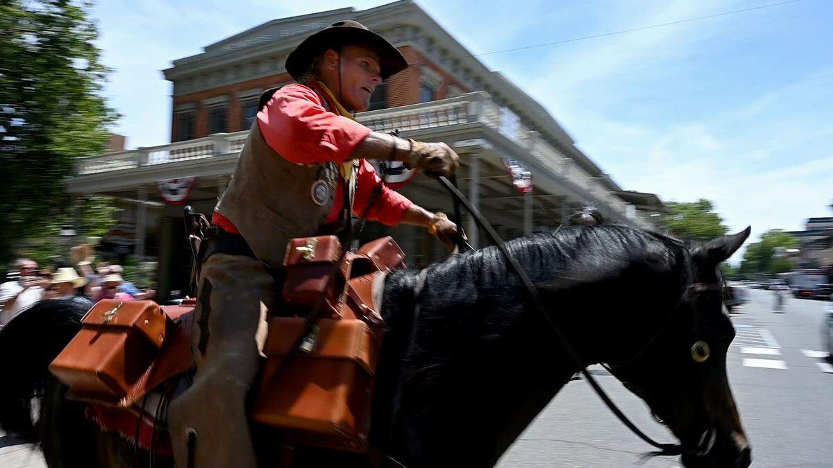 Steve Pool, who has been riding in The Pony Express for 20 years, heads off from Old Sacramento on his Arabian horse “Guy” on Wednesday, June 16, 2021, in the Pony Express re-ride. More than 750 riders are expected to take part in the event, handing off letters across 1,966 miles to St. Joseph, Missouri, in 10 days or less.