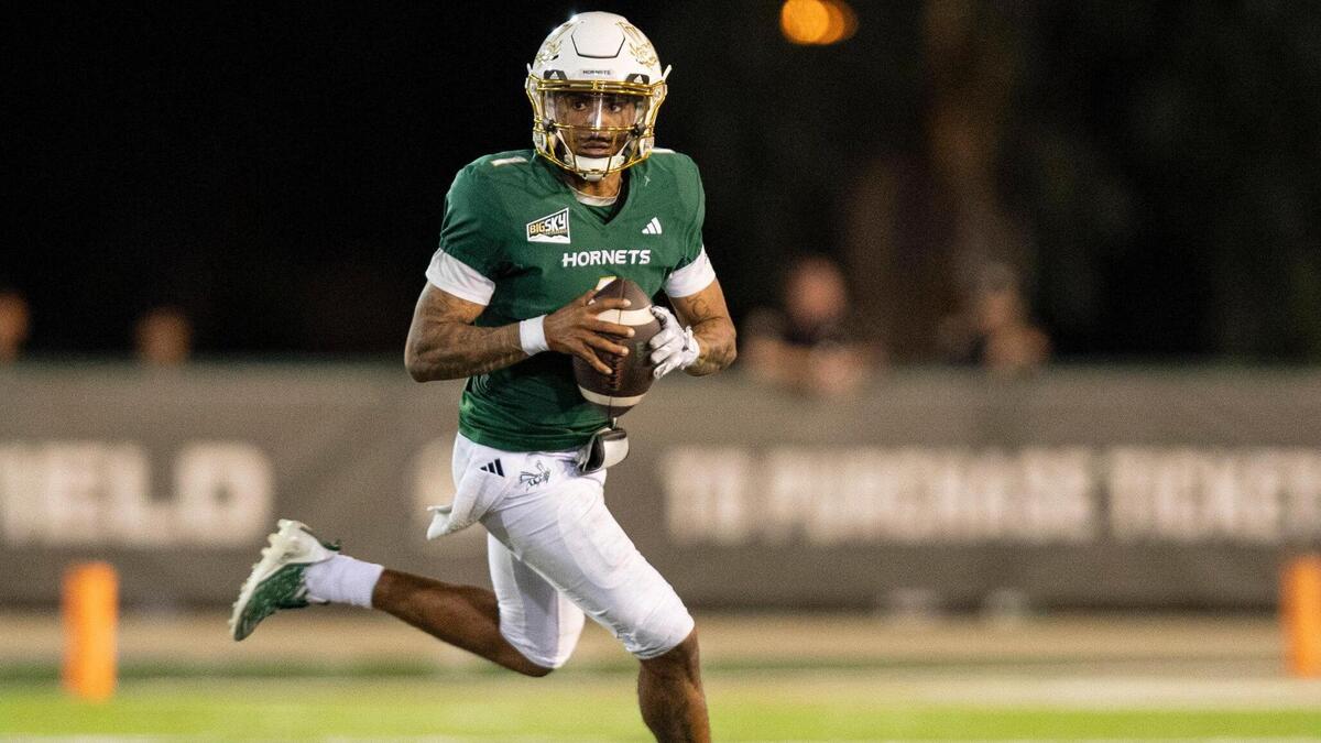 Sacramento State Hornets quarterback Kaiden Bennett (1) looks for an open receiver during the first half of the NCAA football game at Hornet Stadium on Saturday.