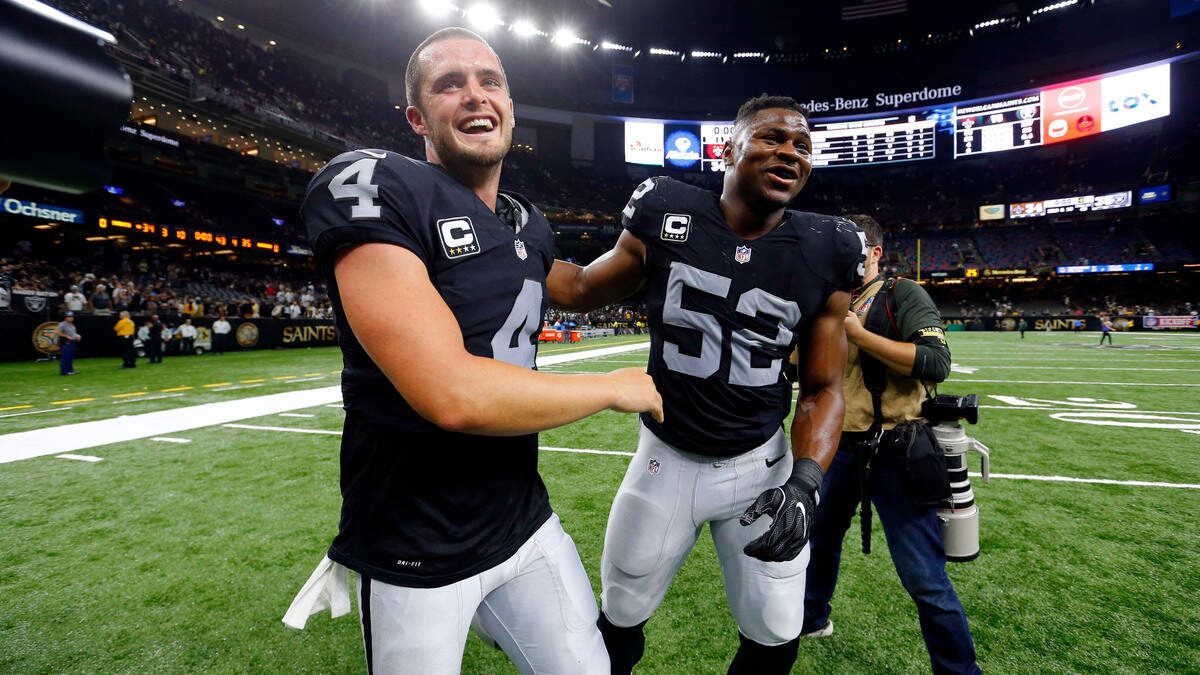 Quarterback Derek Carr (4) and defensive end Khalil Mack were drafted by the Raiders in 2014, Mack fifth overall and Carr 36th. Carr spoke Monday about Mack, who was traded to the Chicago Bears this weekend.