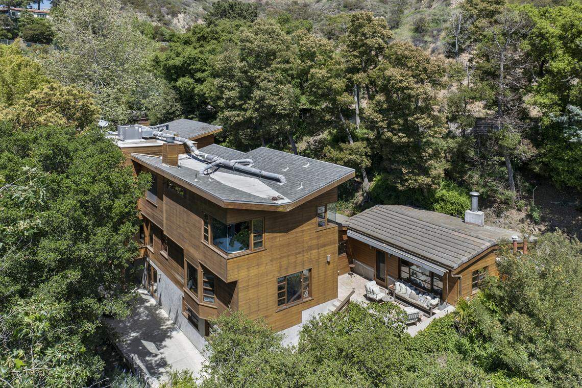 Listed for $5.9 million, the home sits on botanical grounds and projects nature-meets-modern vibes both inside and out.