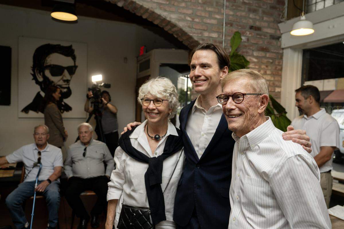 Supporters are photographed with U.S. Rep. Kevin Kiley at Fourscore Coffee in Roseville on election night Tuesday.