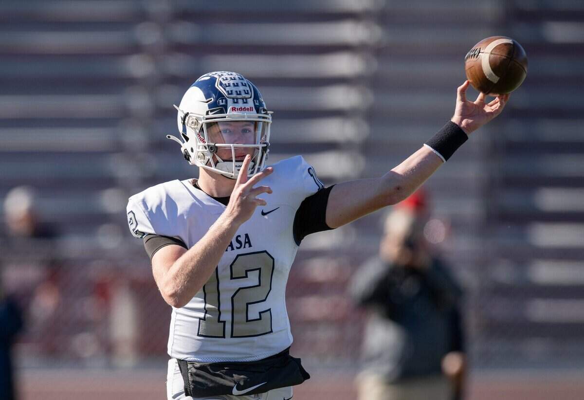 Casa Roble Rams quarterback Connor Campbell (12) passes against Twelve Bridges during the 2023 CIF Sac-Joaquin Section Division V football championship game at Hughes Stadium.