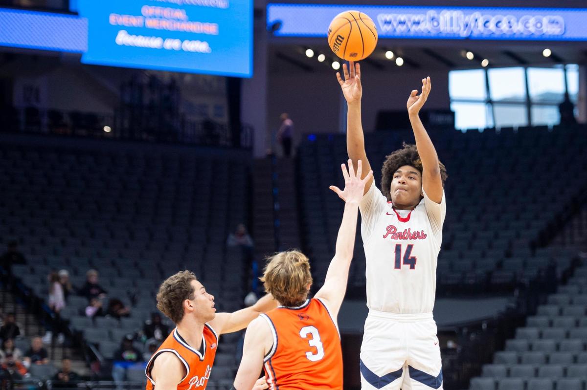 San Joaquin Memorial Panthers forward Julius Olanrewaju (14) takes a jump shot over Pacifica Christian Tritons Parker Strauss (3) in the second half in the CIF State Division II Boys Basketball Championship on Saturday, March 11, 2023, at Golden 1 Center in Sacramento. The Panthers defeated the Tritons 58-47.