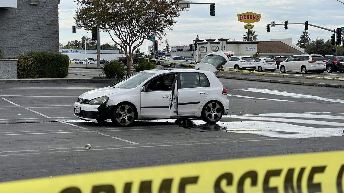 Bomb squad personnel were searching a Volkswagen hatchback Wednesday, September 21, 2022, after its driver allegedly threw an on-fire object at a parked vehicle in Roseville, California. The driver was arrested.