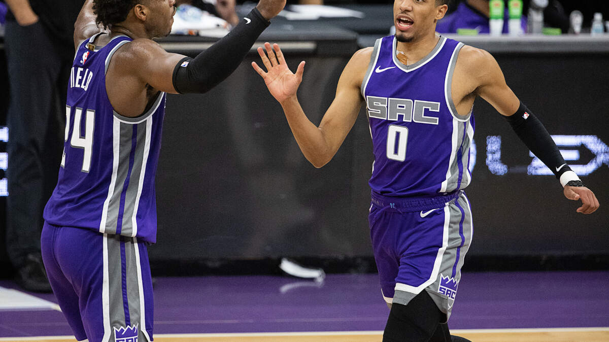 Sacramento Kings guard Buddy Hield (24) congratulated Sacramento Kings guard Tyrese Haliburton (0) in the second quarter during a game at Golden 1 Center on Wednesday, Jan. 13, 2021 in Sacramento.