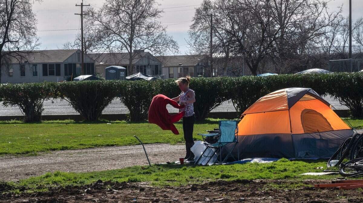 A homeless encampment next to the Placer County government center in North Auburn is seen in January 2021. Last week, the county cleaned up the site and opened a mobile temporary shelter as part of a settlement filed by some living in the camp.