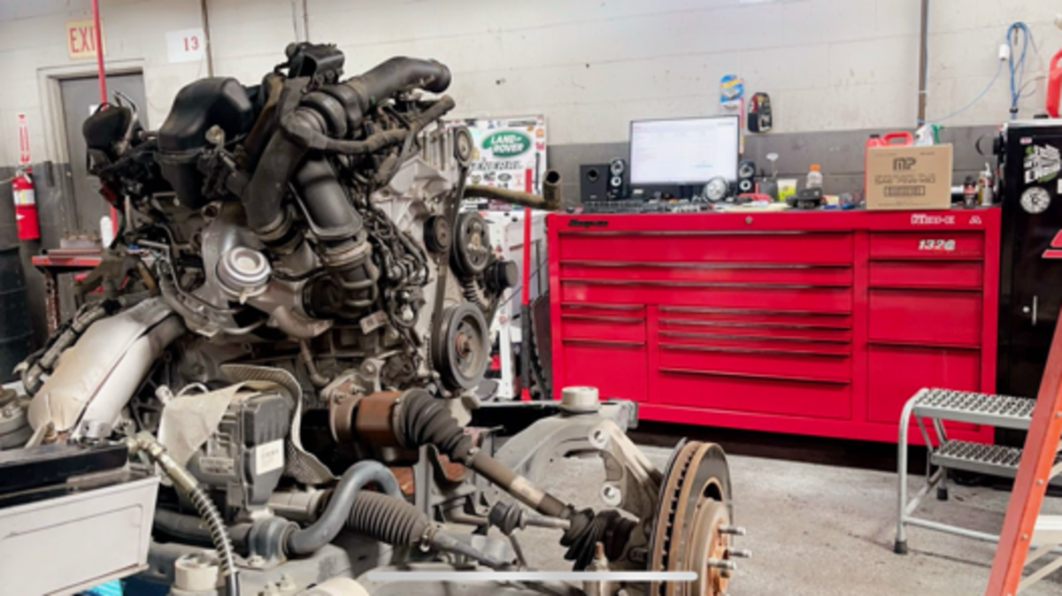 The author’s “pride and joy” Snap-On toolbox and an engine she was in the process of building on a Ford automobile.