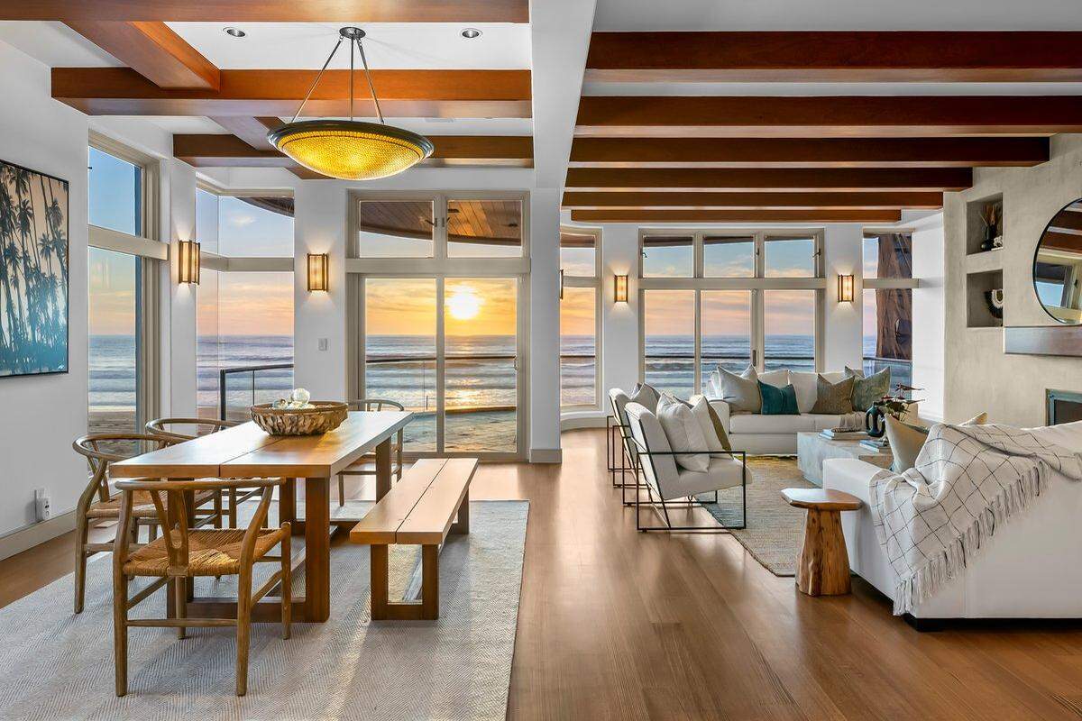Highlights of the five-bedroom, six-bathroom home include an elevator, a 360-bottle wine cellar, floor-to-ceiling windows, exposed ceiling beams and an architectural staircase that was built in one piece and then transferred to the home.