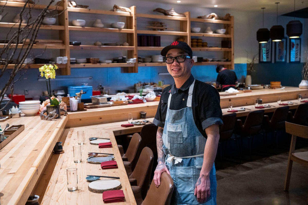 Kru Contemporary Japanese Cuisine chef and co-owner Billy Ngo stands at the East Sacramento restaurant Friday.