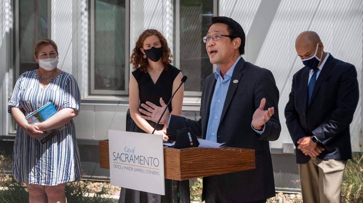 Paul Lau, CEO and general manager of the Sacramento Municipal Utility District, speaks during a news conference in Sacramento in 2021. Lau announced plans to retire in summer 2026, ending a nearly 45-year career at SMUD that included leading the utility’s clean-energy transition and carbon reduction efforts.