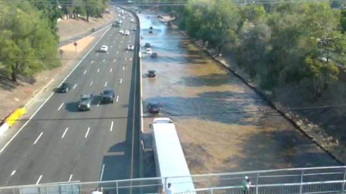 A water main break flooded the southbound lanes of Highway 99 near the 12th Avenue exit Monday July 20, 2020, in Sacramento, California.