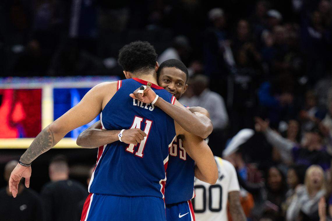 Sacramento Kings guard De’Aaron Fox (5) embraces his teammate forward Trey Lyles (41) following an NBA game against the Utah Jazz on Saturday, Nov. 16, 2024 at Golden 1 Center.