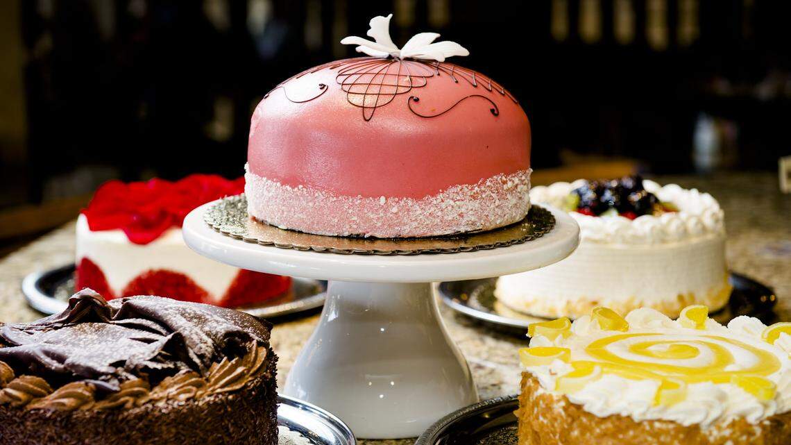 The Princess Torte, center is surrounded by Chocolate Mousse, Red Velvet, Fruit Basket and a Lemon Chiffon cakes at Ettore’s European Bakery & Restaurant Wednesday February 18, 2015 in Sacramento.