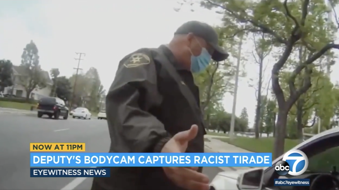 Body camera footage shows a woman telling a Los Angeles County sheriff’s deputy during a traffic stop in San Dimas that he’ll “never be white.”