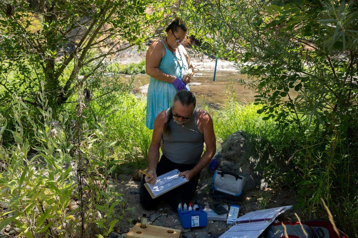 Kimberly Petree, executive director of Cosumnes Culture and WaterWays and a descendent of a Miwok tribe that lived in the area, tests the water quality of the north fork of the Cosumnes River in El Dorado County with her husband Joe Speck earlier this month.