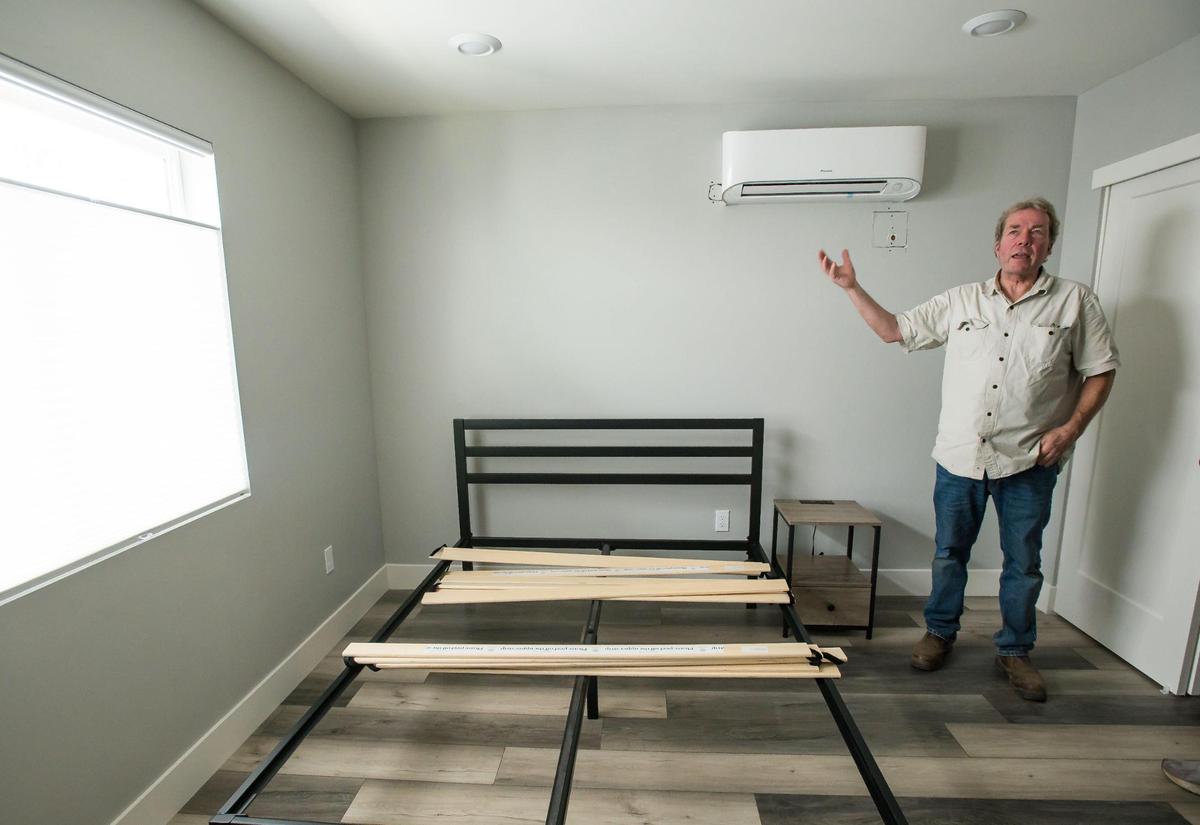 George Warren is building two ADUs&nbsp;— accessory dwelling units — on his midtown Sacramento property by Anchored Tiny Homes out of Fair Oaks. Warren talks on July 13 inside one of the bedrooms about possibly renting the units fully furnished for traveling nurses.