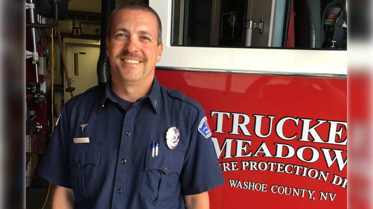 Battalion Chief Ryan Rizzuto stands in uniform in an undated photo provided by the Truckee Meadows Fire Protection District. Rizzuto and his wife, Danielle Rizzuto, were killed Sunday, Dec. 8, 2025, in a crash near Kyburz that seriously injured their two children, according to the El Dorado County Sheriff’s Office.
