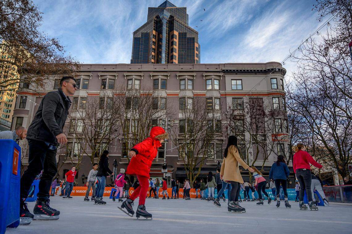 Skaters find their balance as they enjoy a clear day at the downtown Sacramento ice rink on Friday, Dec. 27, 2019. The rink is open daily until Jan. 20. Admission is $6 for kids 6 and under, and $13 to $15 for adults depending on the day.