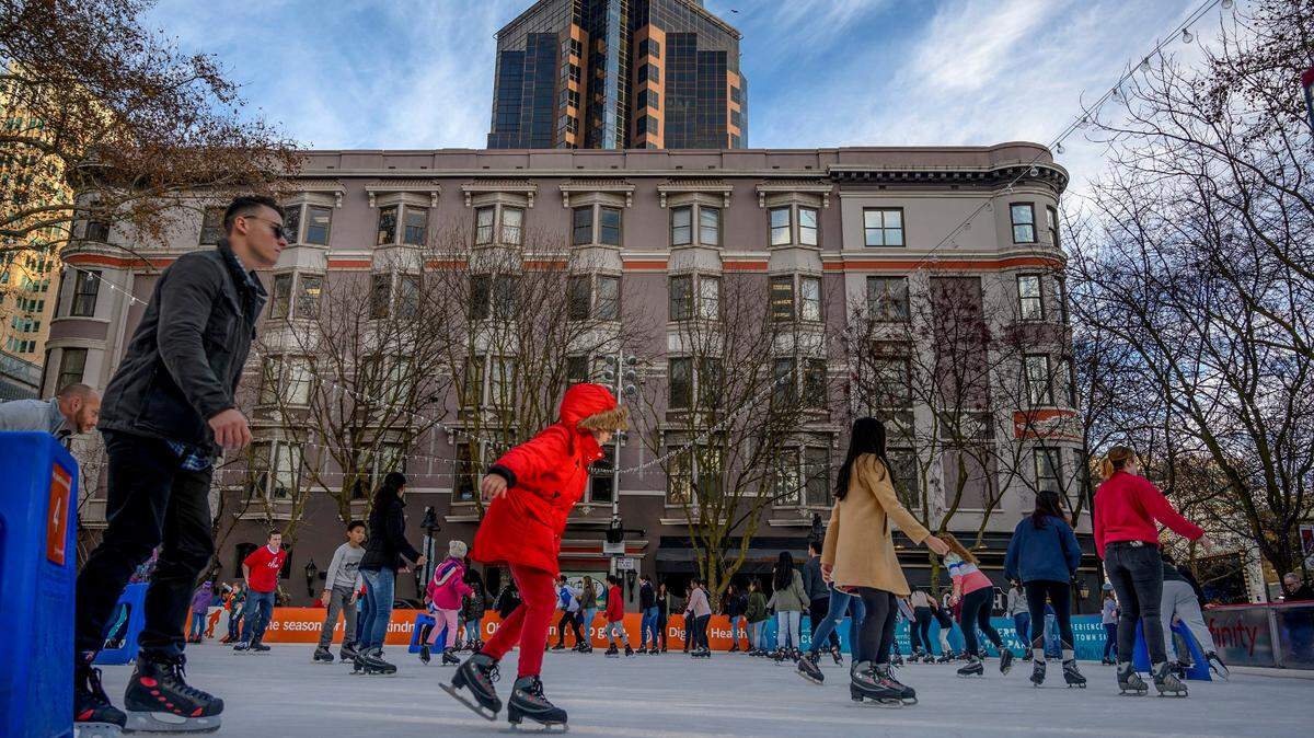 Skaters find their balance as they enjoy a clear day at the downtown Sacramento ice rink on Friday, Dec. 27, 2019.