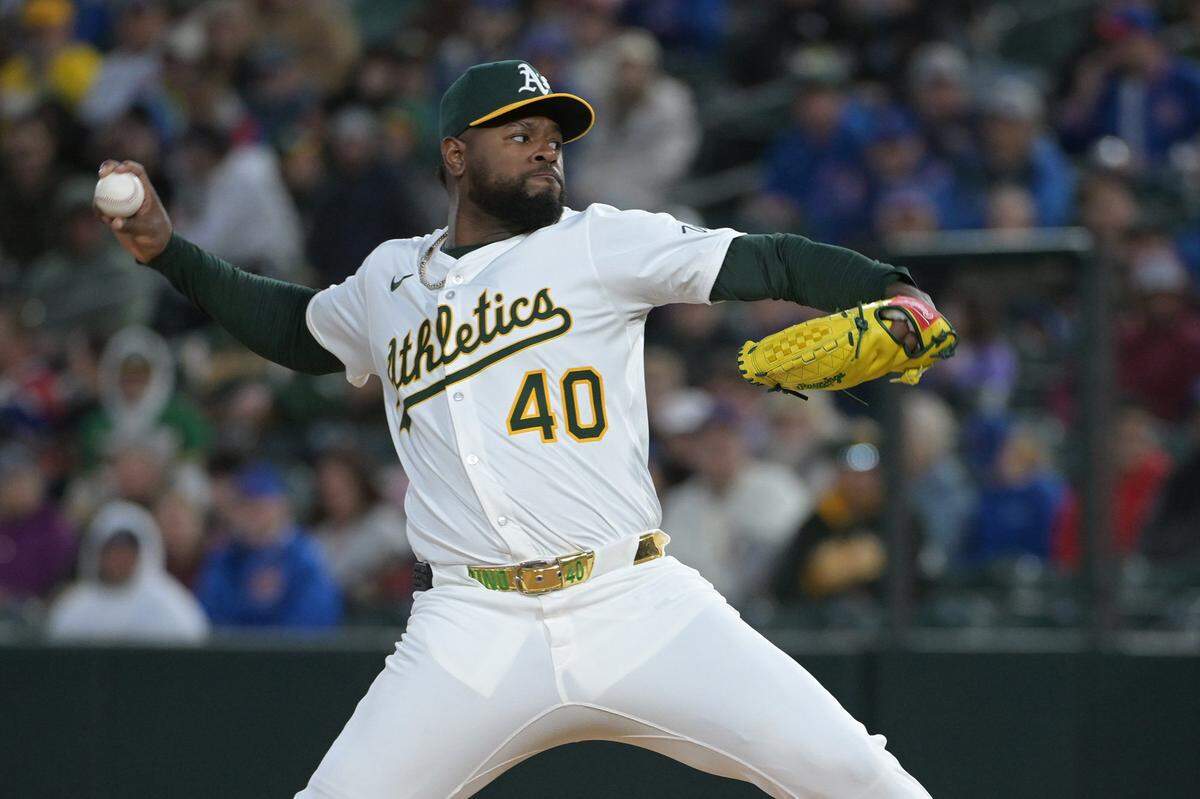 Apr 1, 2025; West Sacramento, California, USA; Athletics starting pitcher Luis Severino throws a pitch against the Chicago Cubs during the second inning at Sutter Health Park. Mandatory Credit: Ed Szczepanski-Imagn Images