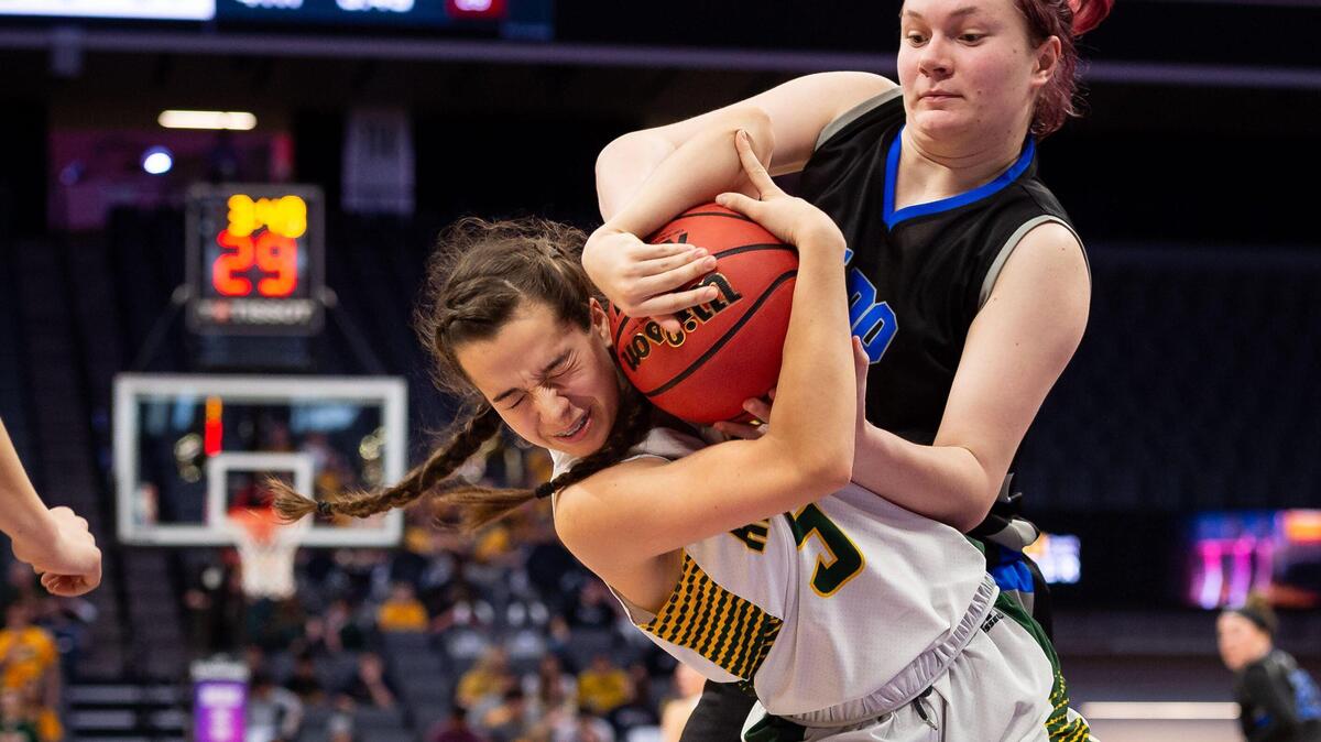 Argonaut’s Jasey Emerson, left, and El Dorado’s Kim Quicksall fight for a rebound during the fourth period of the high school girls basketball Sac-Joaquin Section Division IV championship Thursday, Feb. 27, 2020, at Golden 1 Center in Sacramento. Argonaut beat El Dorado 45-37 to become Division IV champs.