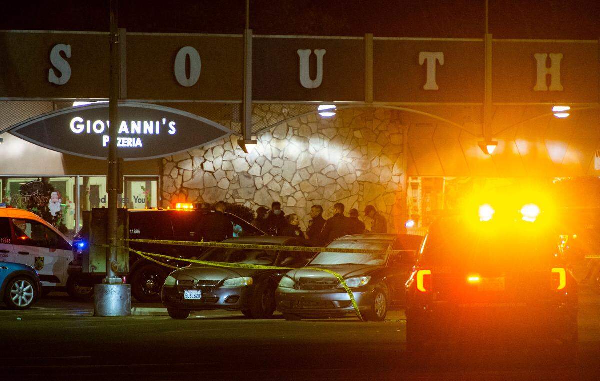 Sacramento Police investigate a shooting at South Hills Shopping Center in South Land Park on Sunday, Jan. 2, 2022.