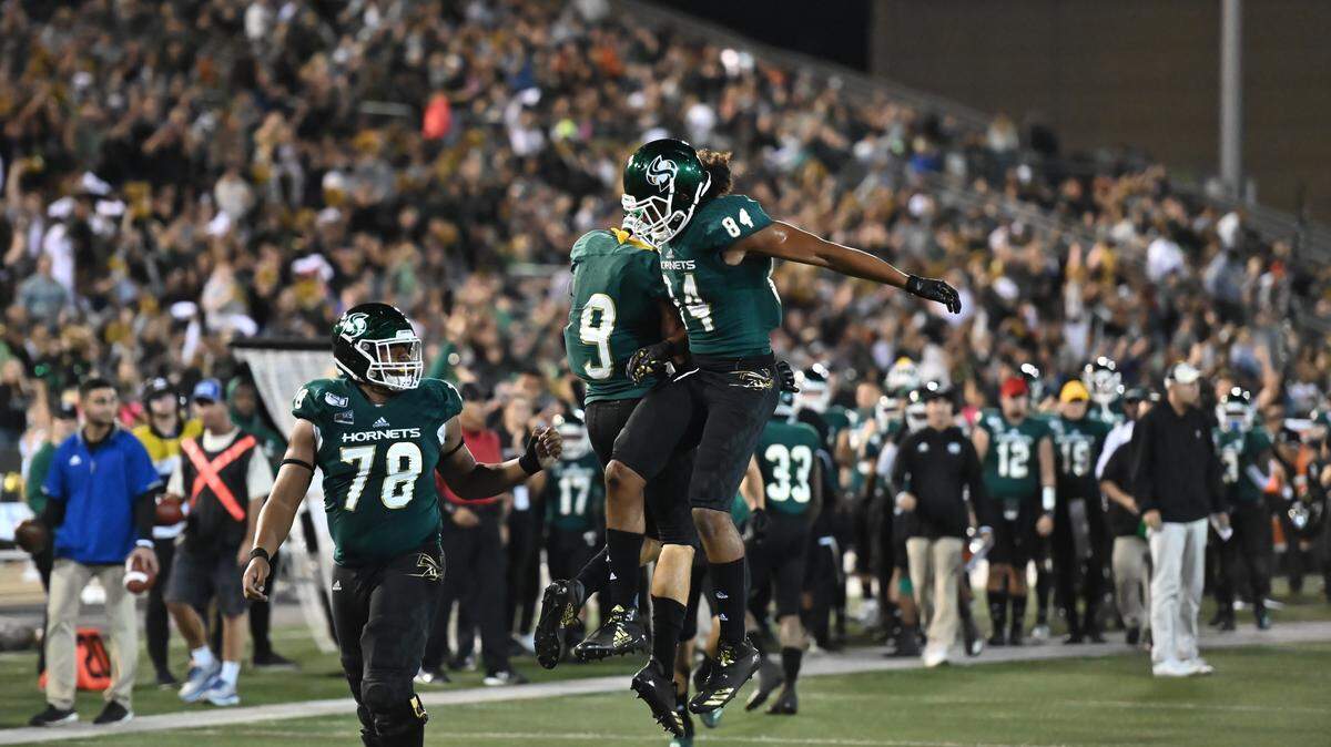 Sacramento State receiver Pierre Williams celebrates with receiver Parker Clayton. The Hornets have had plenty to celebrate this year in earning the No. 7 ranking in FCS.