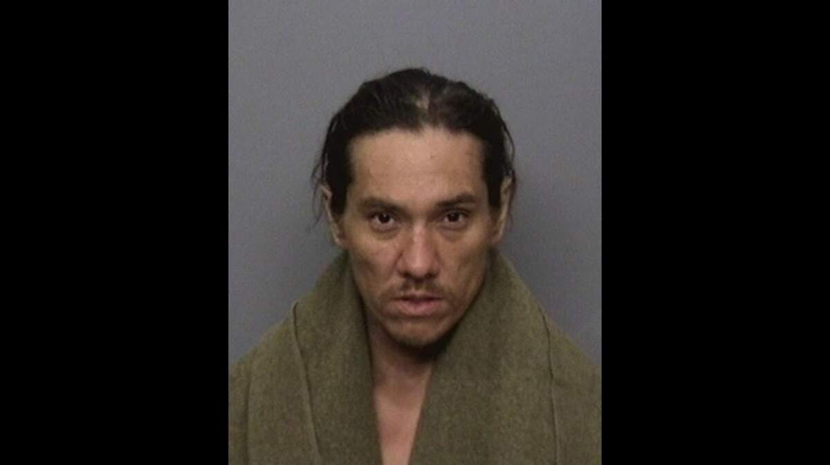 Gentry Ching, 40, was arrested after allegedly stealing a shotgun and leading officers on a pursuit through the woods west of Cedars Road, according to the Redding Police Department.