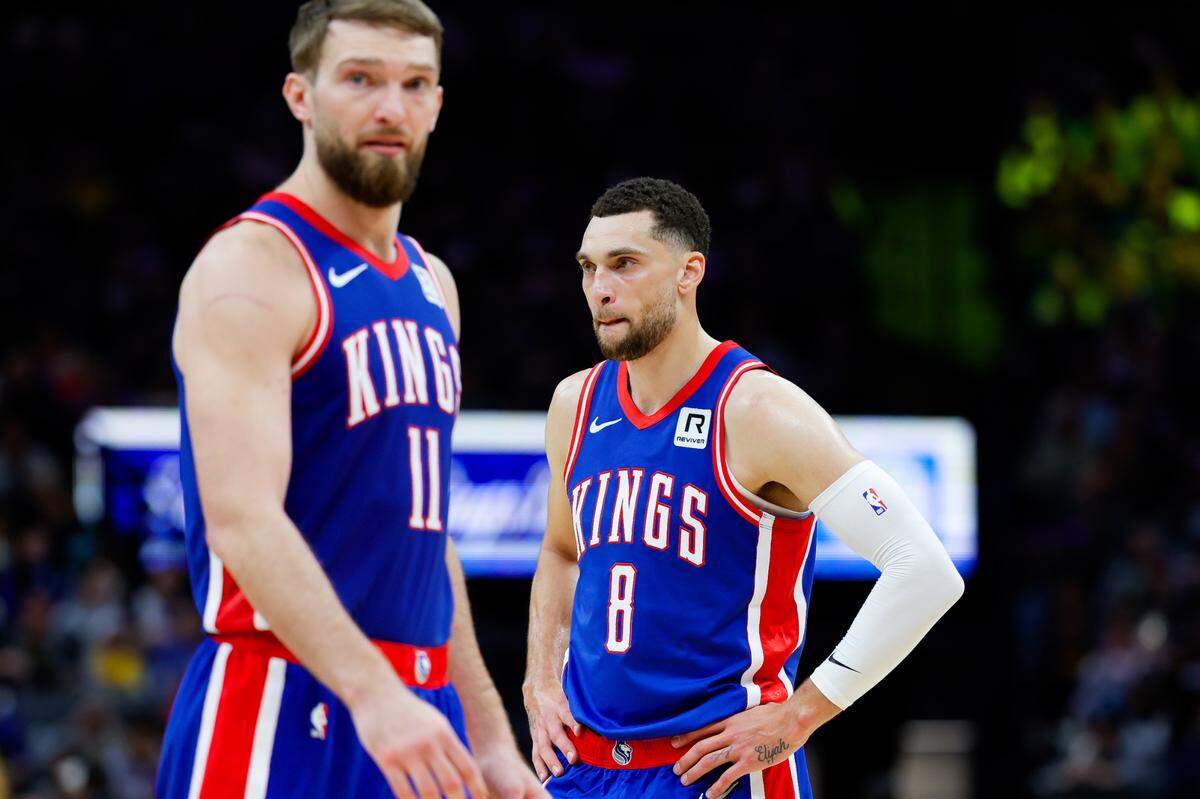 Sacramento Kings guard Zach LaVine (8) and center Domantas Sabonis (11) look on during the fourth quarter against the Golden State Warriors on Feb. 21, 2025, at Golden 1 Center.