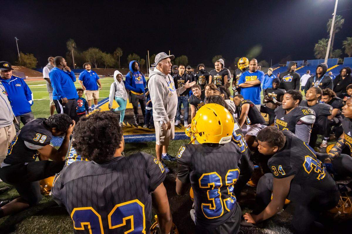 Grant Pacers head coach Mike Alberghini, talks to his team after their loss to Downey High School Knights, in a first-round CIF playoff game, Friday Nov. 2, 2018.