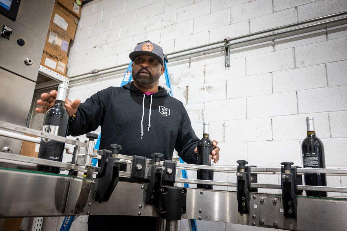 Retired baseball star Greg Vaughn keeps his eye on a wine bottling production line at E2 Family Winery in Lodi in January. “I just didn’t want to put my name on a bottle that I had nothing to do with,” he said. “I wanted to learn as much about the business as I could and I’m still learning.”