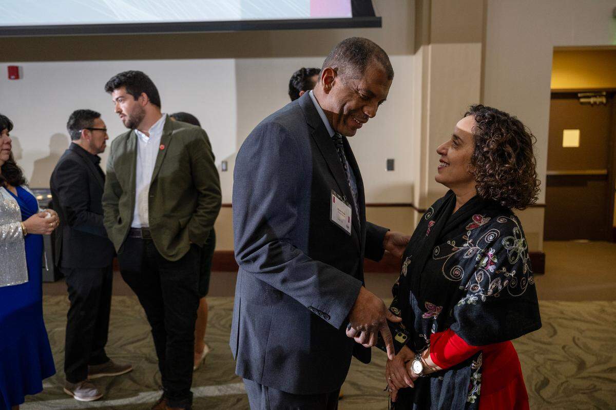 Change Makers Martin Ross and Ana Bolaños share a moment before receiving their awards during the Change Makers Celebration 2025 on Friday at Sacramento State.