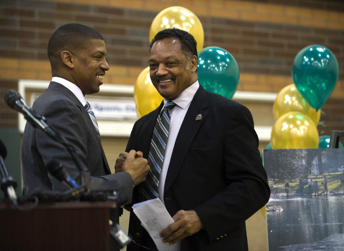 Rev. Jesse Jackson, left, shakes hands with Sacramento Mayor Kevin Johnson during an event at the Sacramento Boys and Girls club on March 2, 2009, to launch an effort to boost volunteerism in the community,