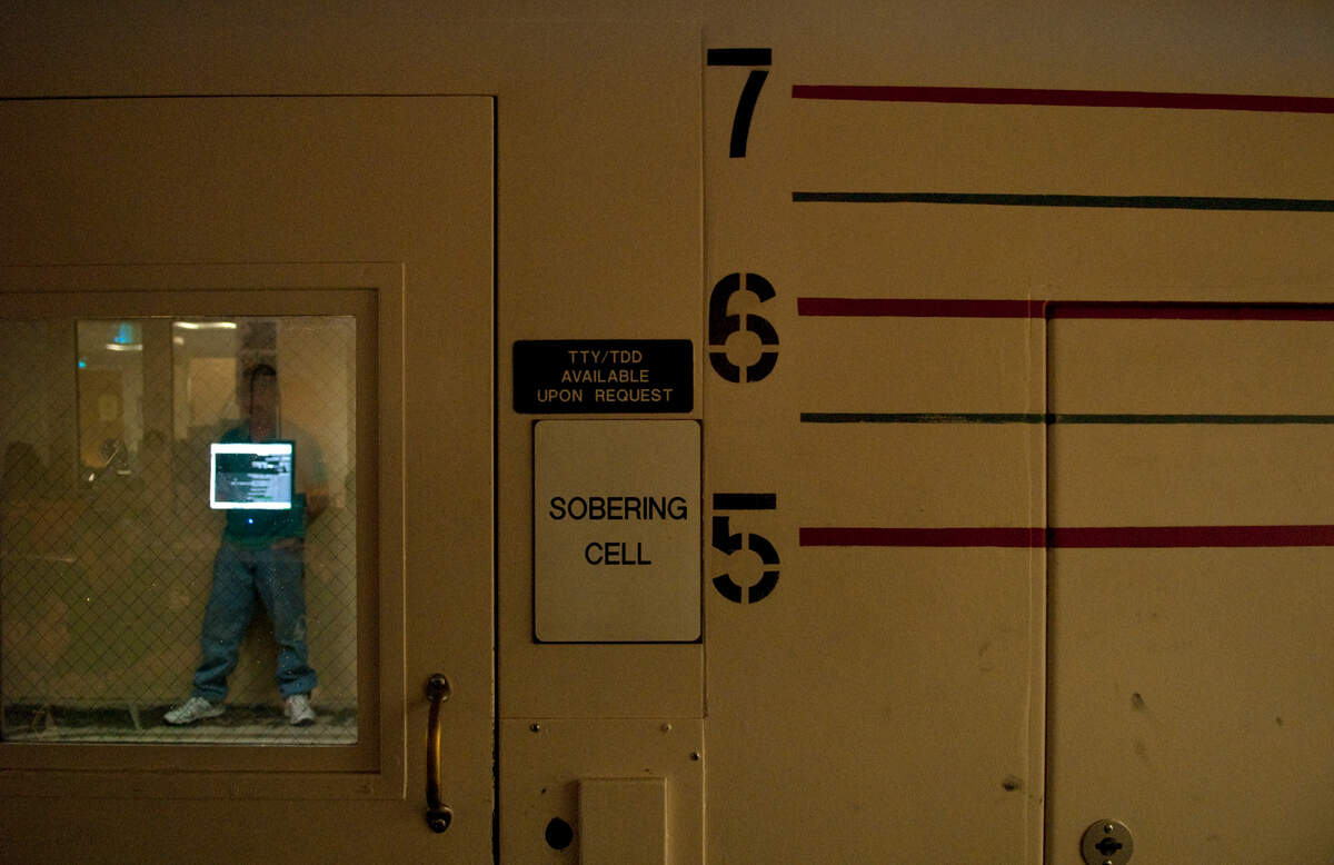 An inmate stands inside the sobering cell at the Sacramento Main Jail on April 30, 2009. Inmates are placed in the “drunk tank” until they are sober enough to be release or transferred to a different area of the jail.