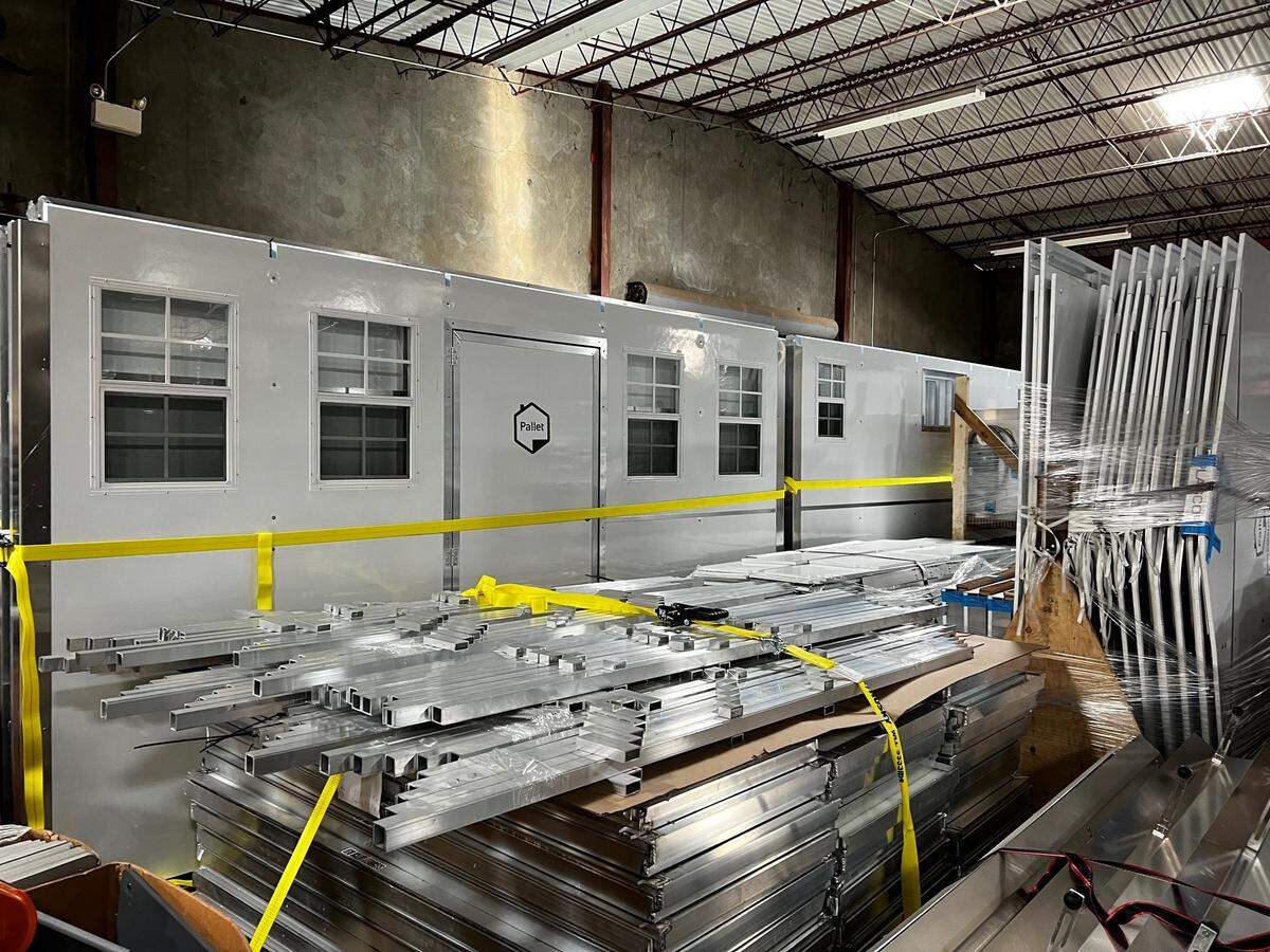 Pallet cabins for a new 100-unit tiny home community that will be built on the site of a former grocery store at 8144 Florin Rd. in May 2022.