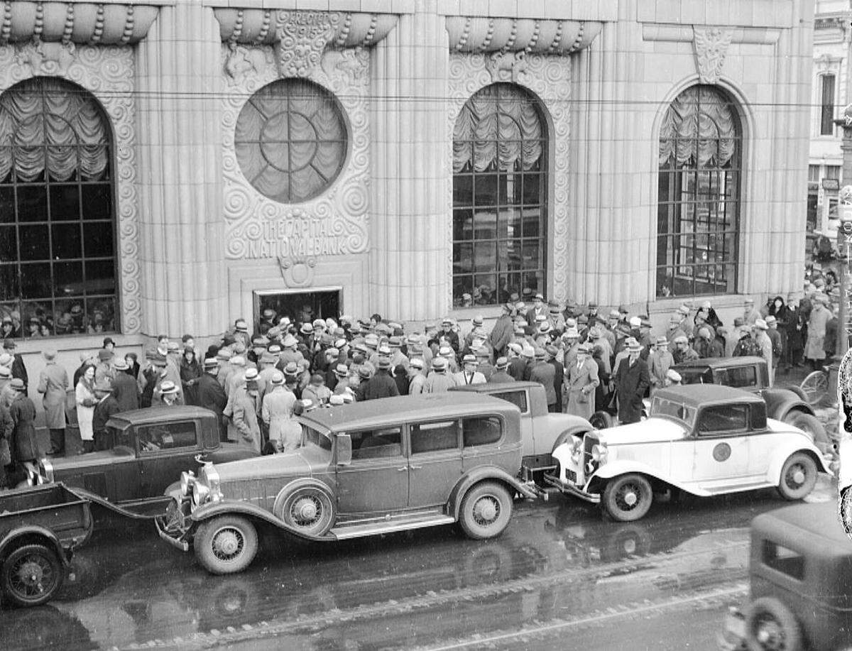 A large crowd forms outside Capital National Bank on J Street in downtown Sacramento during a run on the bank in 1933.