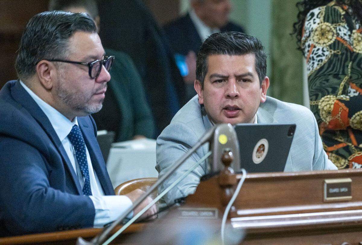 Assemblyman David Alvarez, D-San Diego, right, talks with Eduardo Garcia, D-Coachella, during a session in 2023. Alvarez is working to make affordable housing more accessible in California’s Coastal Zone.