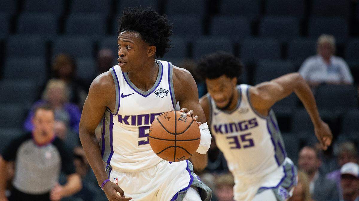 Sacramento Kings guard De’Aaron Fox (5) drives up court with rookie Marvin Bagley III on his trail during a preseason game against Maccabi Haifa at Golden 1 Center on Monday in Sacramento.