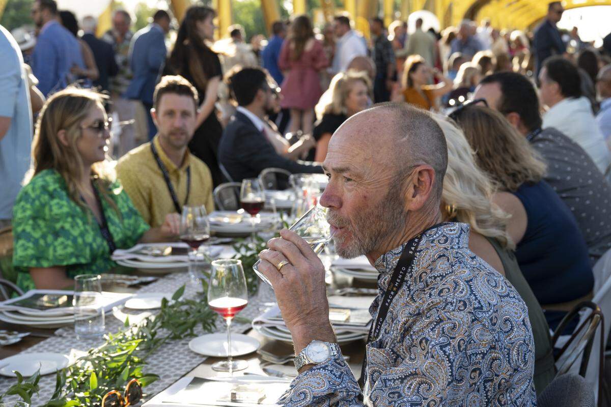 Guests dine on Tower Bridge during the Tower Bridge Dinner on Sunday, Sept. 7, 2025.