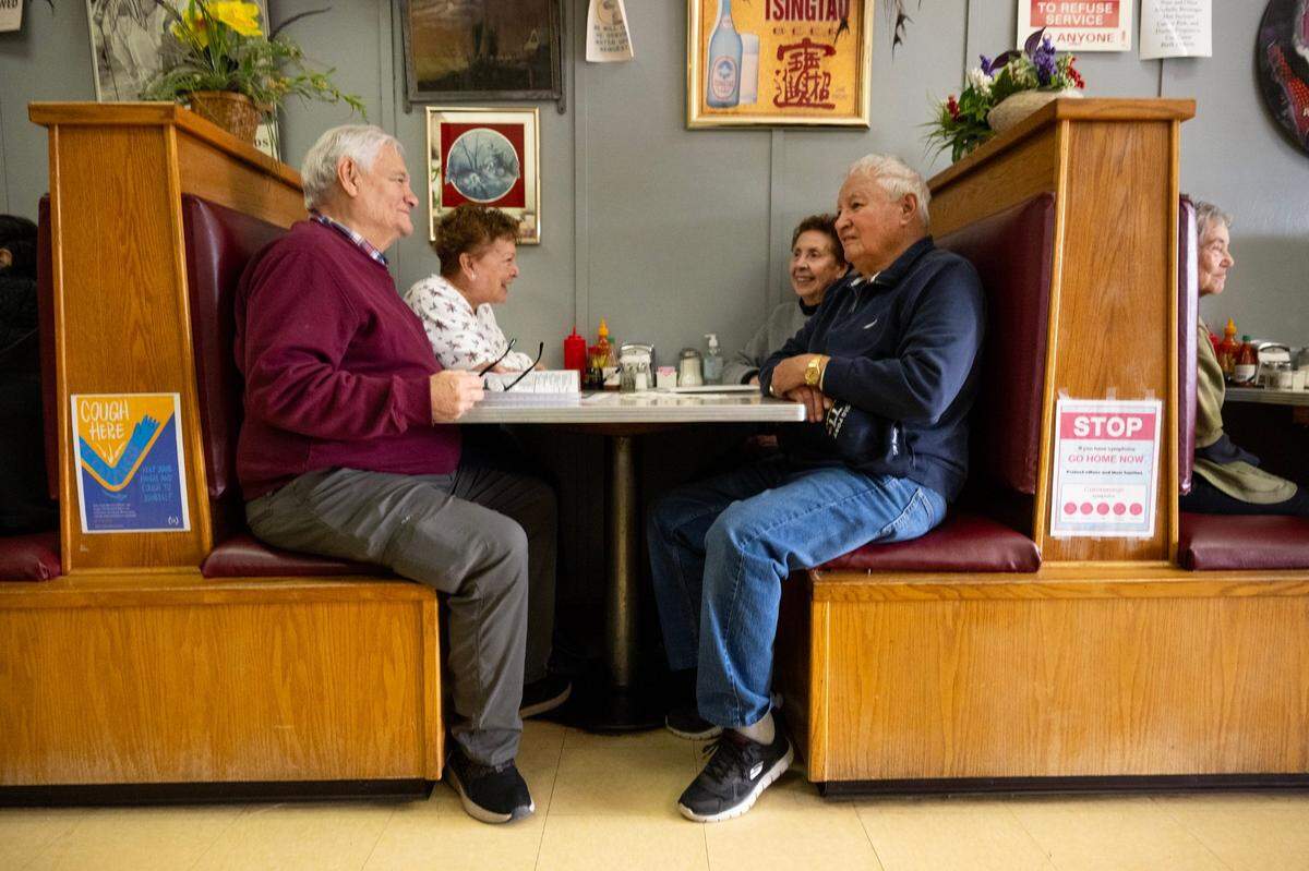 Melton Losoya, 80, with his wife Frances, 78, sister-in-law Sara and his brother Jack Losoya, 88, wait to order their food last month in Woodland. They said they have been coming to the restaurant since they were children.