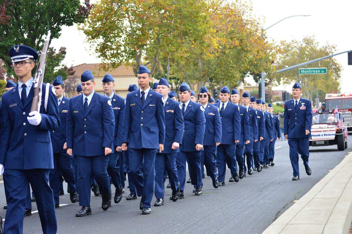 The Wayne Spence Folsom Veterans Day parade, named after Jess Wayne Spence in 2009, marches past Montrose Drive on Nov. 11, 2021. The city assured detours around the parade this year will be marked, and drivers are encouraged to take Riley and School streets as alternate routes.