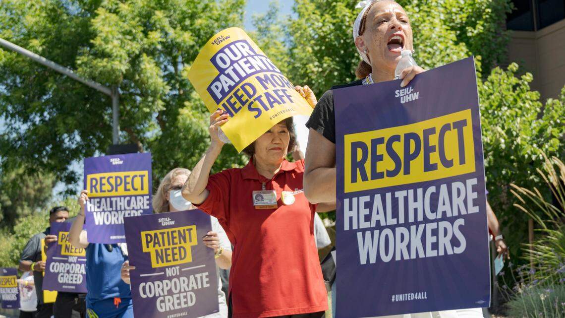 Kaiser Permanente health care workers picket in July at the company’s Sacramento Medical Center in Arden Arcade. More than 75,000 health workers are expected to walk out for three October days, disrupting care for KP patients in California, Colorado, Oregon, Virginia and Washington.