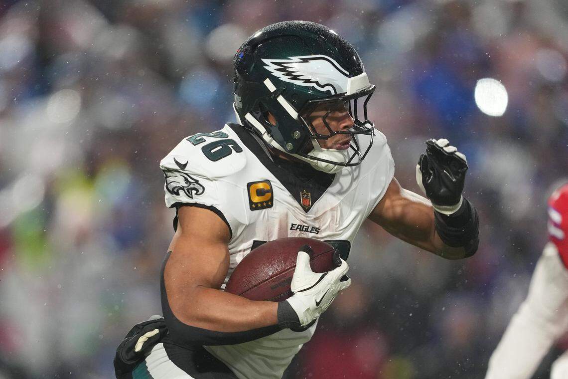 ORCHARD PARK, NEW YORK - DECEMBER 28: Saquon Barkley #26 of the Philadelphia Eagles rushes for yards during the third quarter of the game against the Buffalo Bills at Highmark Stadium on December 28, 2025 in Orchard Park, New York. (Photo by Nic Antaya/Getty Images)