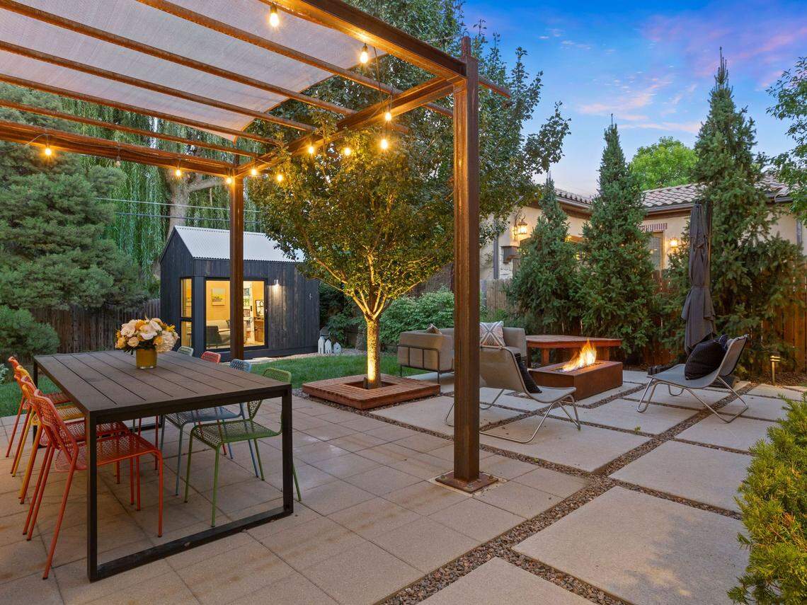 Located on a wide, tree-lined street, the home sits in the coveted Hilltop neighborhood of Denver.