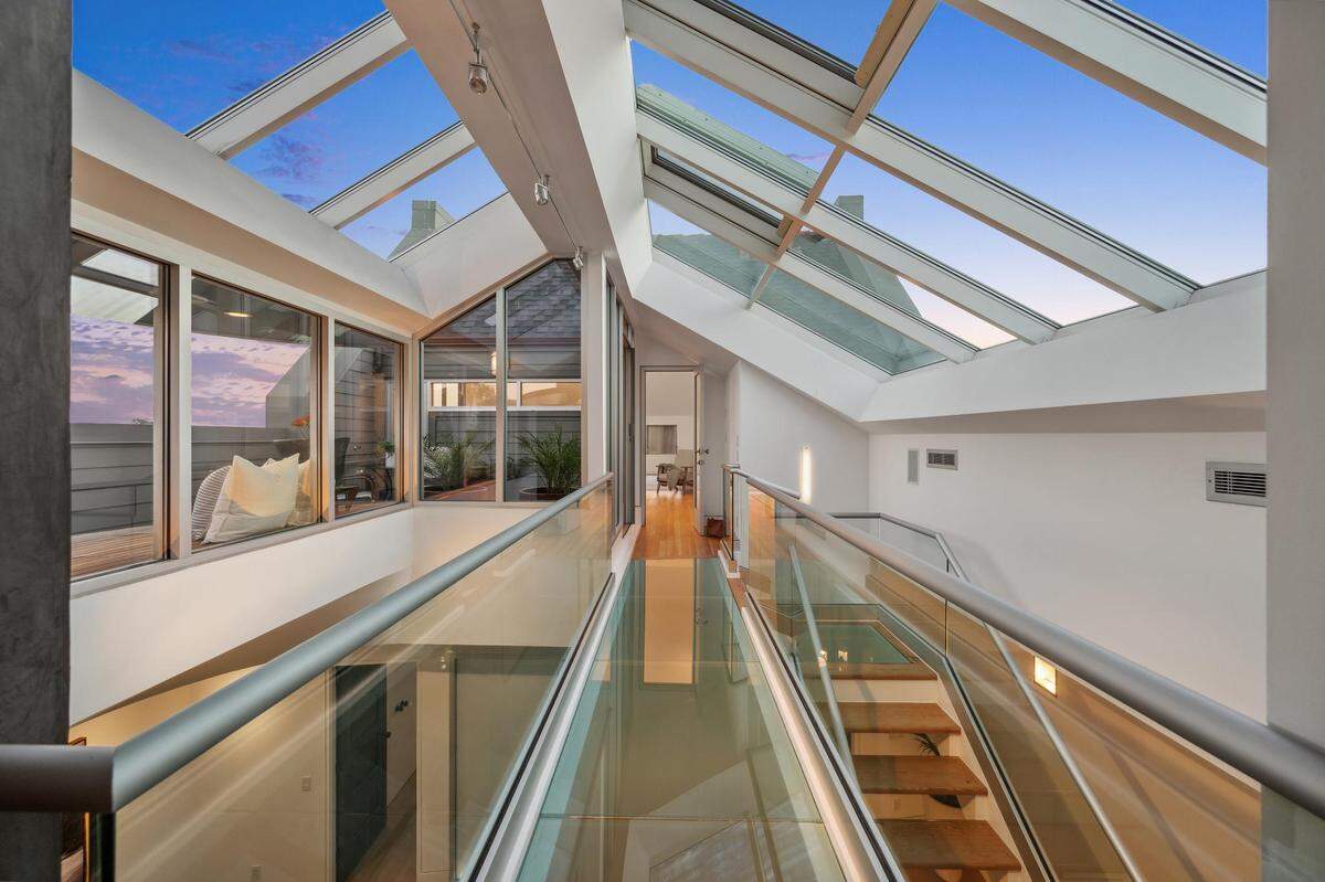 Take the elevator or the stairs to the top floor.