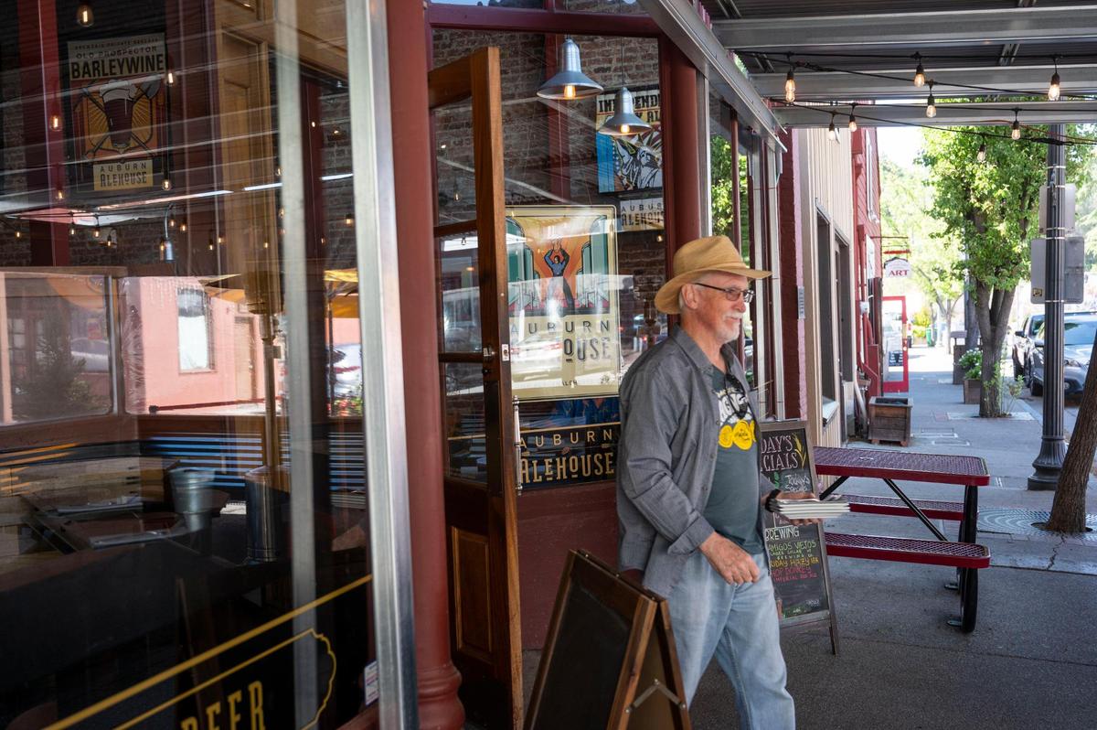 Rich Lynn, of Folsom, walks out of Auburn Alehouse in Auburn on April 5, after he and his family had some drinks and food.