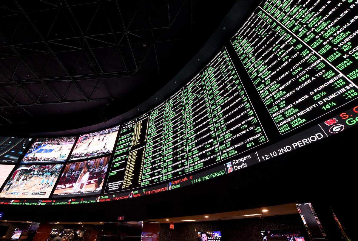 The betting line and some of the nearly 400 proposition bets for Super Bowl in 2016 are displayed at the Race & Sports SuperBook at the Westgate Las Vegas Resort & Casino in Las Vegas which features 4,488-square-feet of HD video screens.